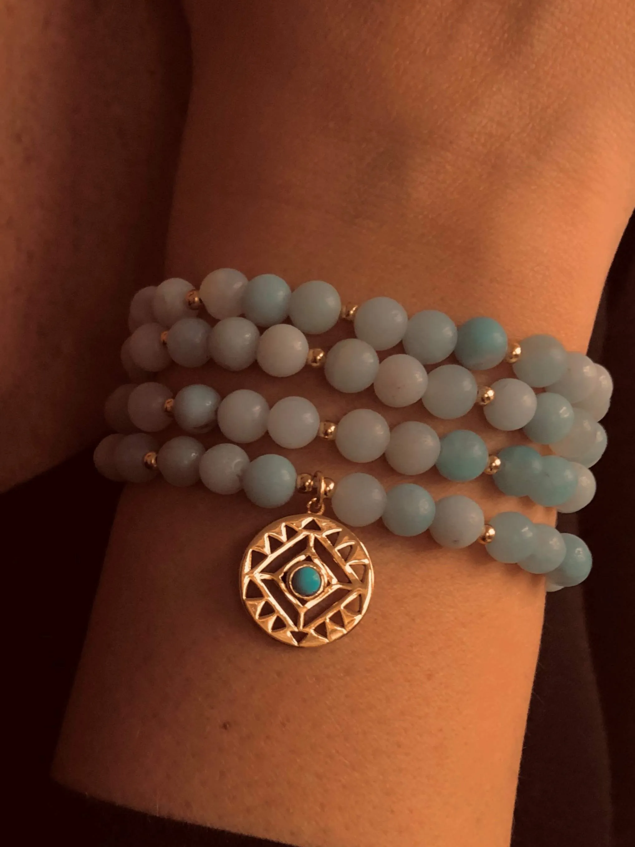 Beaded bracelet assembled from light green Amazonite and 925 silver gilded with 18k yellow gold
