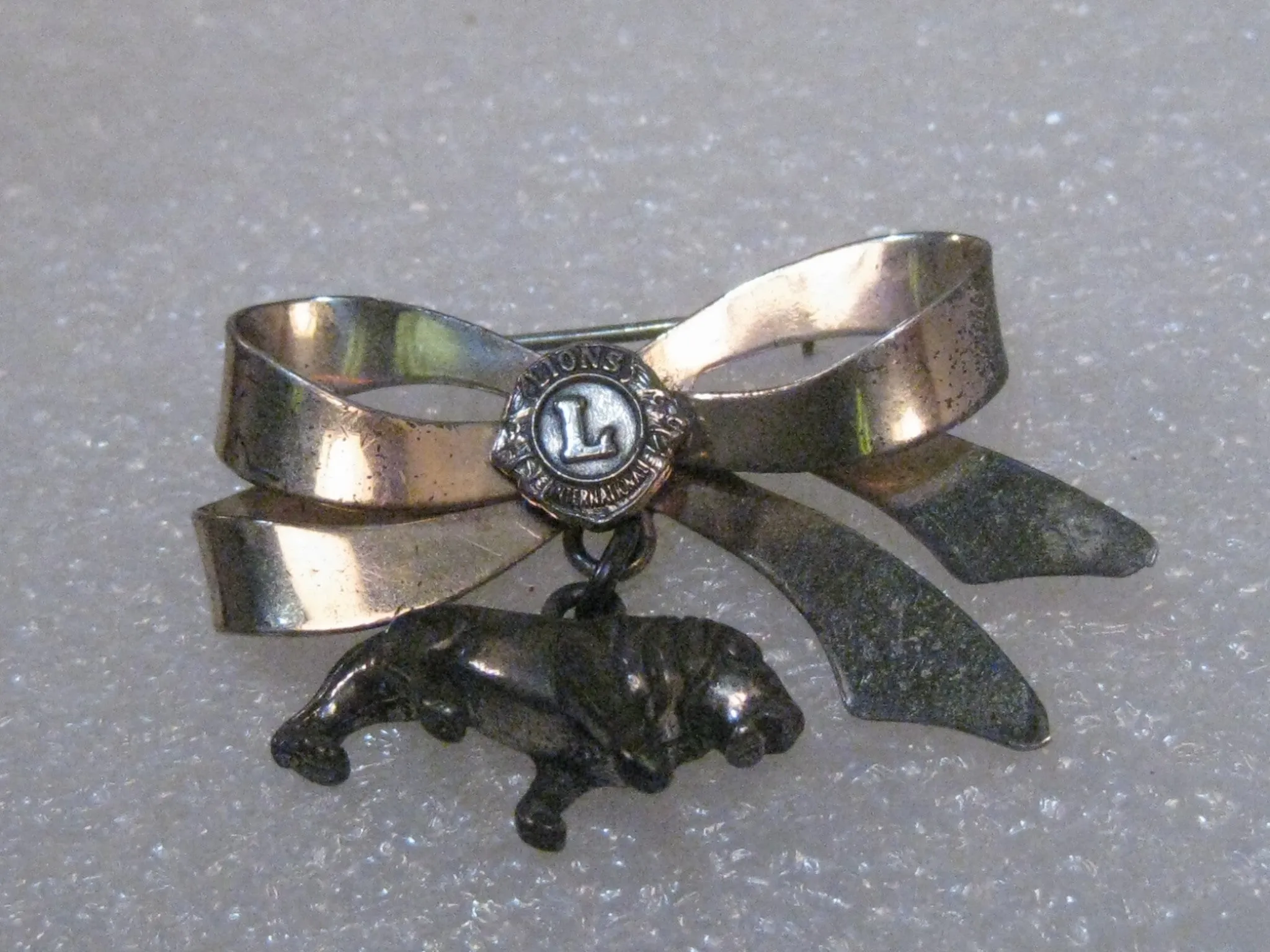 Vintage Sterling Silver Lions International Bow and Dangling Lion Charm Brooch, 1950's