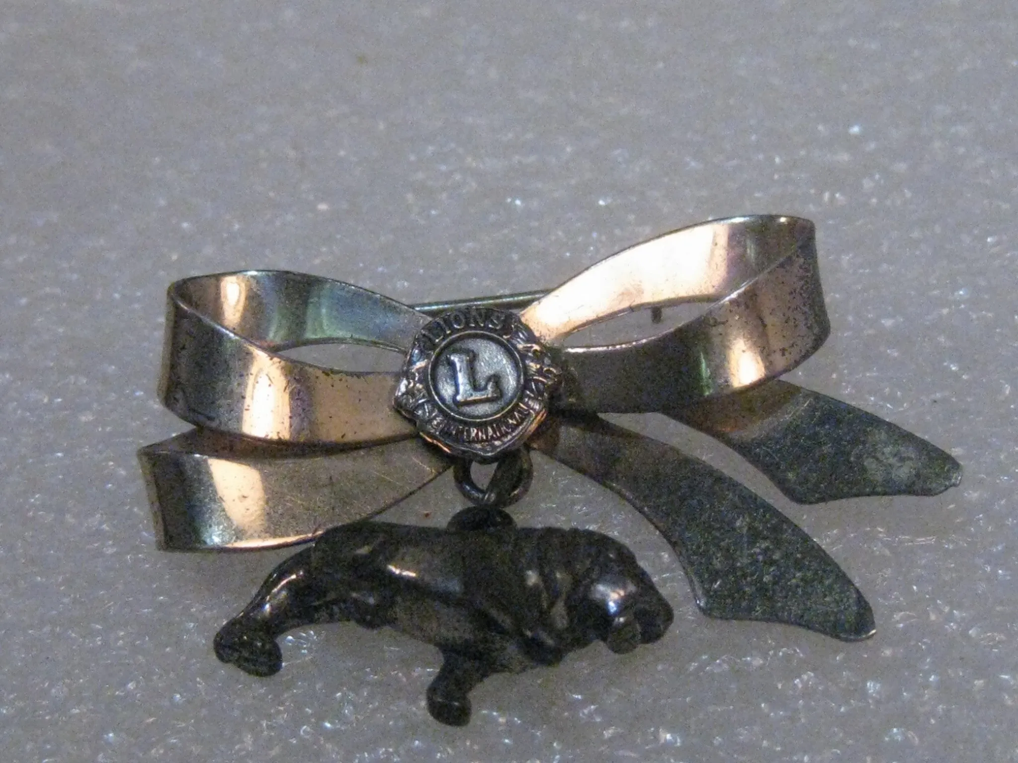 Vintage Sterling Silver Lions International Bow and Dangling Lion Charm Brooch, 1950's